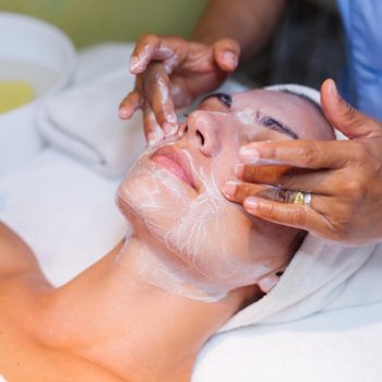 young-woman-lying-cosmetologist-s-table-during-rejuvenation-procedure